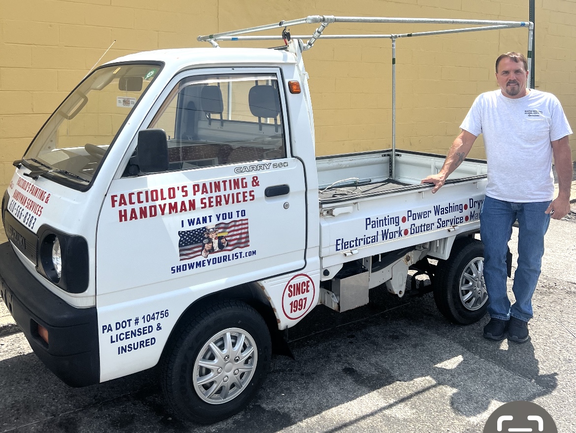 Mike Facciolo with his work truck